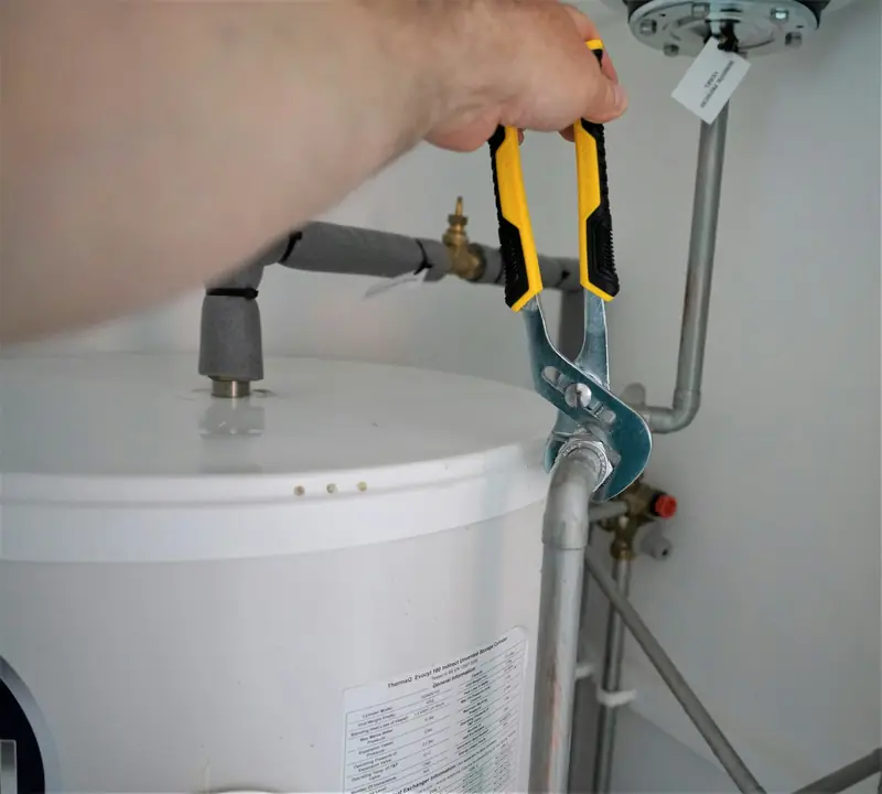 A hot water system being fitted.